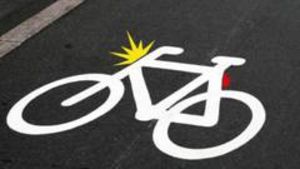 Thermoplast on the bicycle path is remembering you to turn on the lights